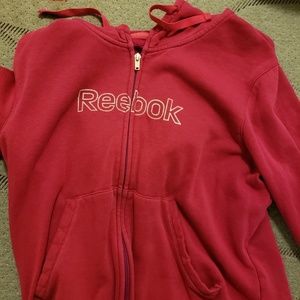 A pink Rebok hoodie
